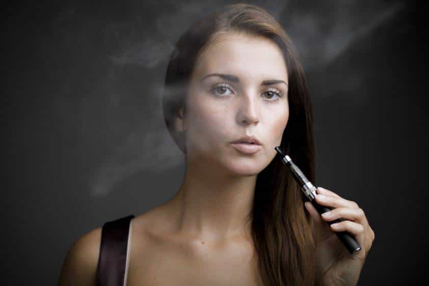 elegant woman smoking e cigarett